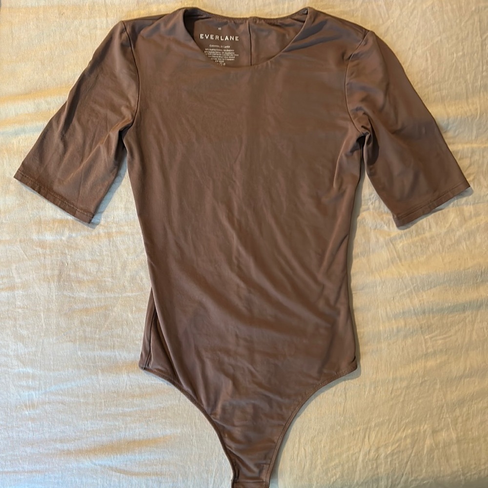 The Short-Sleeve Crew Neck Bodysuit